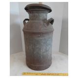 > vtg. metal milk can