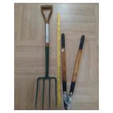 > Yard tools: loppers & potato fork