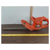 Black and Decker electric 16" hedge trimmer.