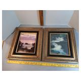 2 carved, dark-toned wooden frames with nature
