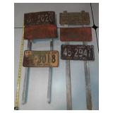 Folk yard art: old Nebraska license plates
