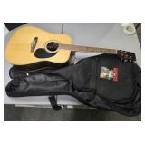 Acoustic guitar with Gig bag and picks