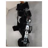 DonJoy X-ROM post-operative hinged knee brace.