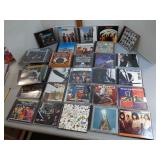 CDs: REO, Cyndi Lauper, Kinks, Rolling Stones,