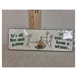 "Fun and games..." metal sign