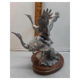 M. Sughroue 1994 pewter sculpture of cranes.