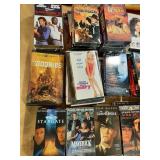 Tote of VHS tapes: Maverick,  Goonies, Green Mile
