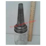 The master oil spout and glass jar
