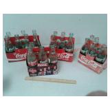 Coca-Cola glass pop bottles and carriers
