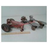 Vintage metal Farmall tractor toy and roller