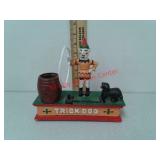 Cast iron trick dog coin bank
