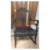 > Antique wooden rocking chair