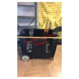 > Carlisle heavy duty plastic cart on wheels and