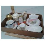 Teacups and saucers plus other ceramic items