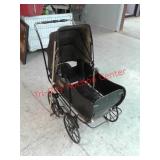 > Antique baby carriage stroller
