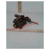 Antique toy John Deere baler