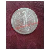 One troy ounce 999 fine silver round