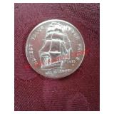 One troy ounce 999 fine silver round -