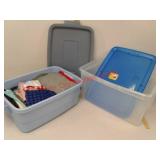 2 plastic totes and lids with contents of hankies
