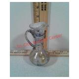 Hand blown glass pitcher