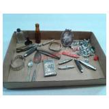 Pocket knives, Monopoly game pieces + + +