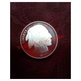 One troy ounce 999 fine silver round