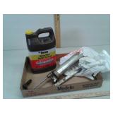 Half full Ortho Home Pest Control, grease gun