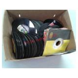Several 45 RPM vinyl record albums