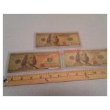 3 gold foil polymer $100 bills