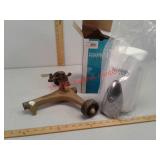 Rainbird cast-iron sprinkler and new stoko