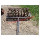 PULL BEHIND EARTH PACKER