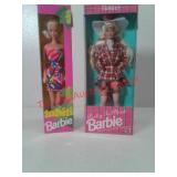 Tahiti and Pretty in Pink Barbie dolls