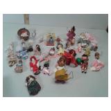 Various dolls and figurines