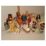 Various dolls and stands