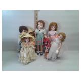 7 dolls with stands