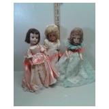 3 dolls with stands