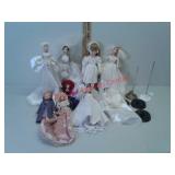 Lot of 9 dolls with stands