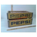 Two vintage Pepsi Cola bottle crates