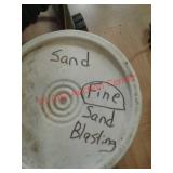 >Five gallon bucket of sand blasting sand / media