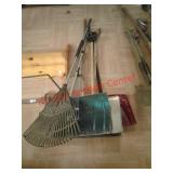 >Lot of rakes and 4 snow shovels