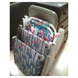 > lot of lawn chairs and one folding chair