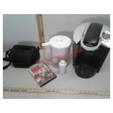 Keurig coffee maker, Brita water pitcher, camera