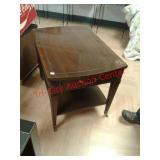 > Vintage Mersman wood end table on casters
