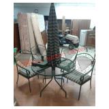 > metal patio table, 4 chairs and umbrella
