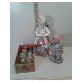 Yard cherubs decor and glass insulators