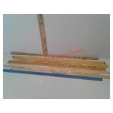 Lot of 9 advertising yardsticks