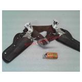 Two vintage cap guns and Holster