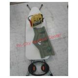 EverStart jump starter, plastic garden sign and