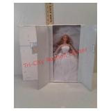 2 new in box Blushing Bride Barbie, copyright
