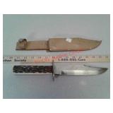 Knife with 8 inch blade in leather sheath